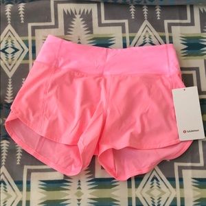 Lululemon mid rise 4” speed Up shorts. Size 4